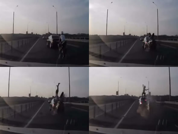 Motoqueiro bate na traseira de um BMW e cai de pé no teto do carro! Será? (foto: Reprodução/YouTube)